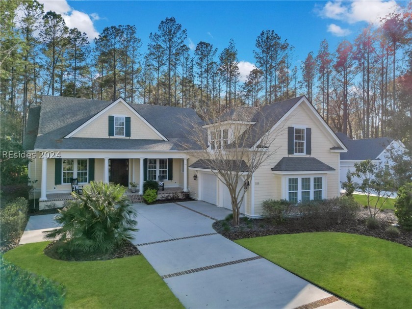 Situated on a private wooded homesite in Hampton Lake, this - Beach Home for sale in Bluffton, South Carolina on Beachhouse.com