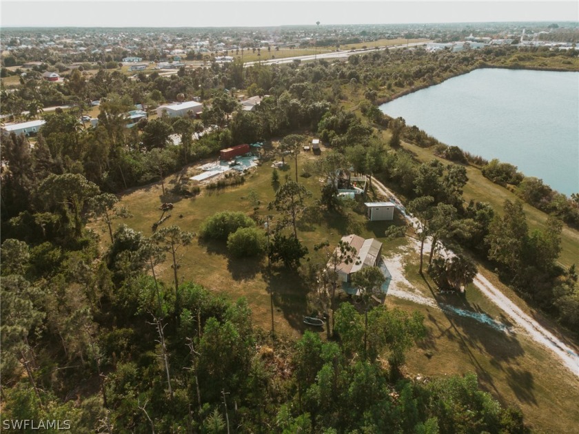 THE PROPERTY IS A TOTAL OF ROUGHLY 2.23 ACRES OF LAND. 
SITUATED - Beach Townhome/Townhouse for sale in Punta Gorda, Florida on Beachhouse.com