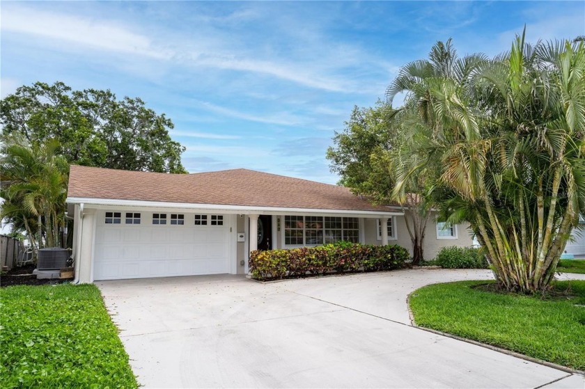 Step into this meticulously maintained ranch home and be greeted - Beach Home for sale in St. Petersburg, Florida on Beachhouse.com