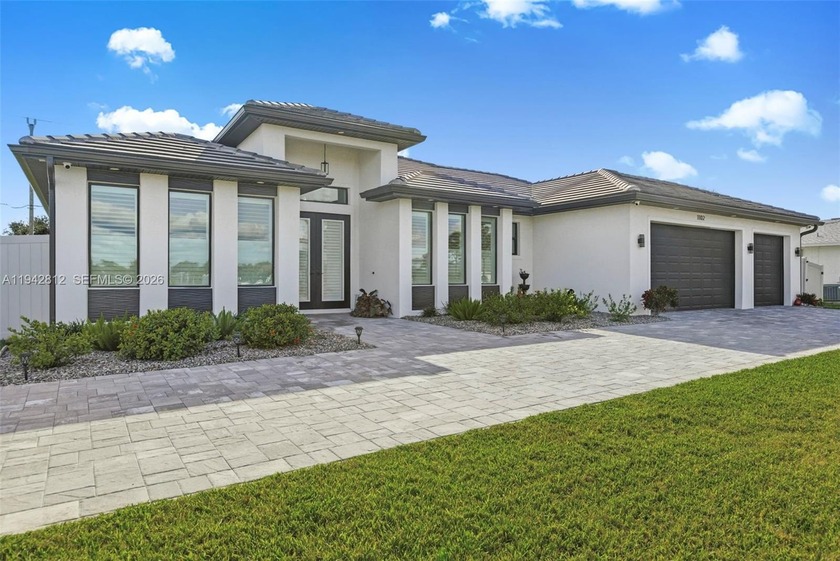 Welcome to this stunning 3 bedroom 3 bath modern pool home in - Beach Home for sale in Cape Coral, Florida on Beachhouse.com