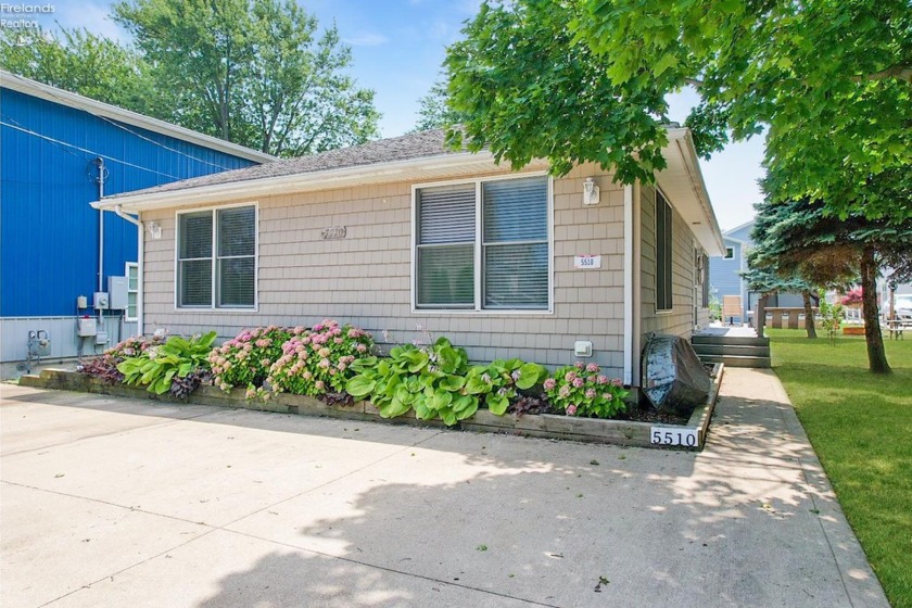 Introducing a picturesque 2 bedroom, 2 bathroom cottage nestled - Beach Home for sale in Port Clinton, Ohio on Beachhouse.com