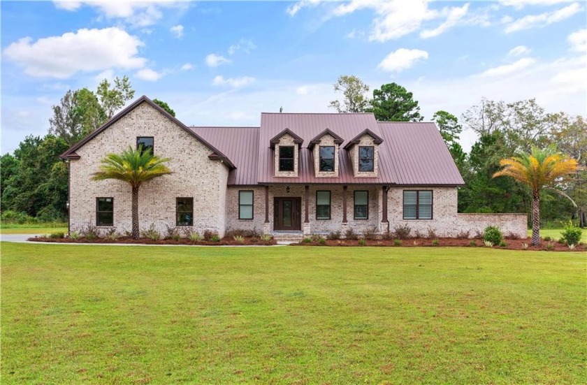 Beautiful brick home situated on nearly 3 acres in the gated - Beach Home for sale in Waverly, Georgia on Beachhouse.com