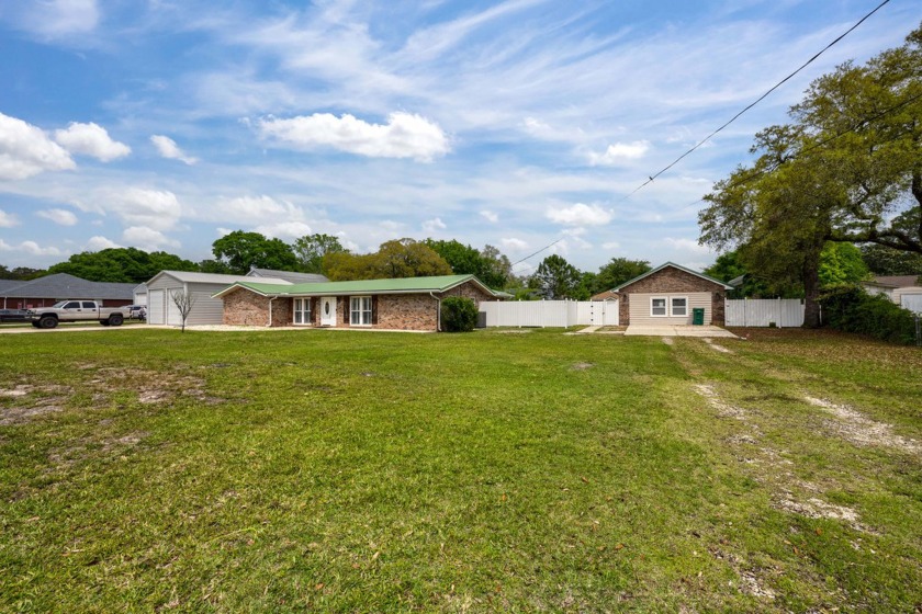 This renovated ranch-style home features 4 bedrooms, 2.5 baths - Beach Home for sale in Fort Walton Beach, Florida on Beachhouse.com