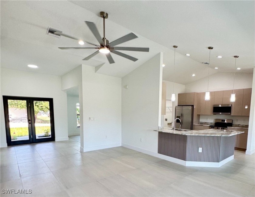 Discover this stunning 4-bedroom, 2-bathroom home featuring an - Beach Home for sale in Lehigh Acres, Florida on Beachhouse.com