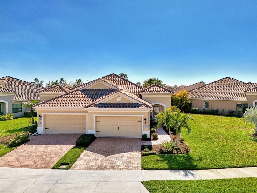 New price on this beautifully maintained villa situated on this - Beach Home for sale in Venice, Florida on Beachhouse.com