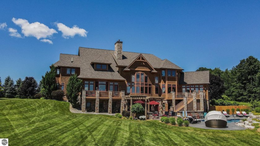 Amazing, customed-designed home situated on 9+ acres with - Beach Home for sale in Williamsburg, Michigan on Beachhouse.com