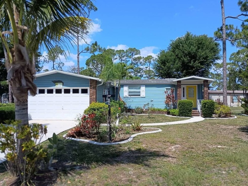 Pine Lakes Country Club Gem! Offering all the benefits of a - Beach Home for sale in North Fort Myers, Florida on Beachhouse.com