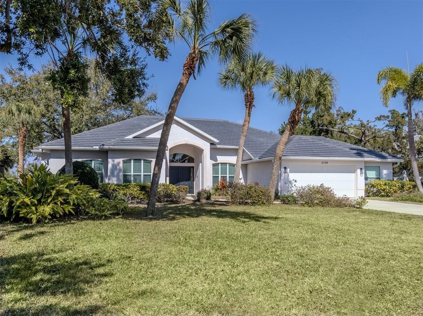 Beautiful Calusa Lakes home with a tranquil setting with an open - Beach Home for sale in Nokomis, Florida on Beachhouse.com