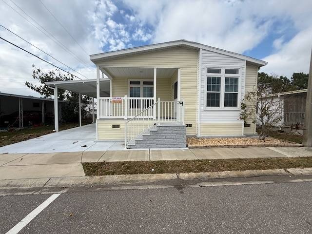 Welcome home to this beautifully maintained and thoughtfully - Beach Home for sale in Dunedin, Florida on Beachhouse.com