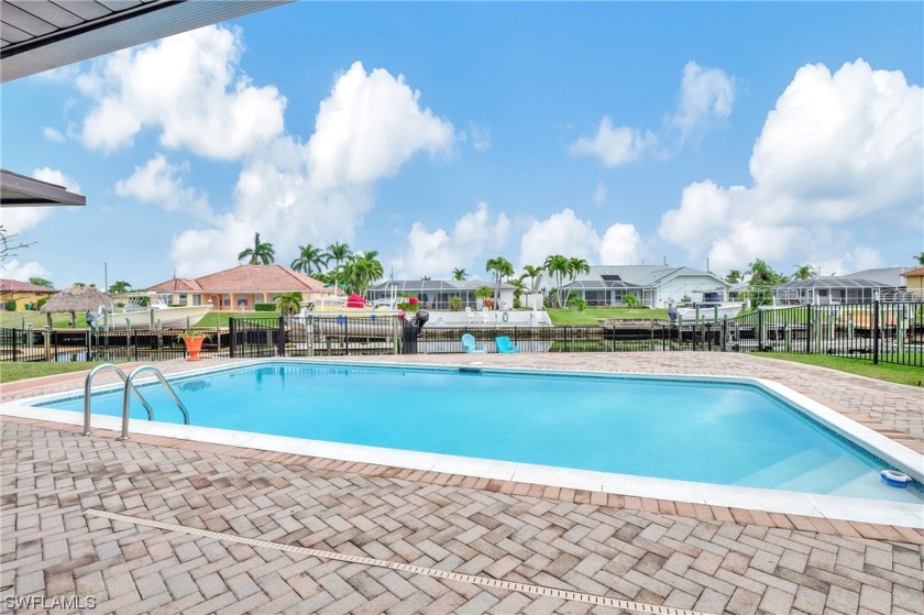SAILBOAT/DIRECT ACCESS HEATED POOL HOME! Perfect opportunity to - Beach Home for sale in Cape Coral, Florida on Beachhouse.com