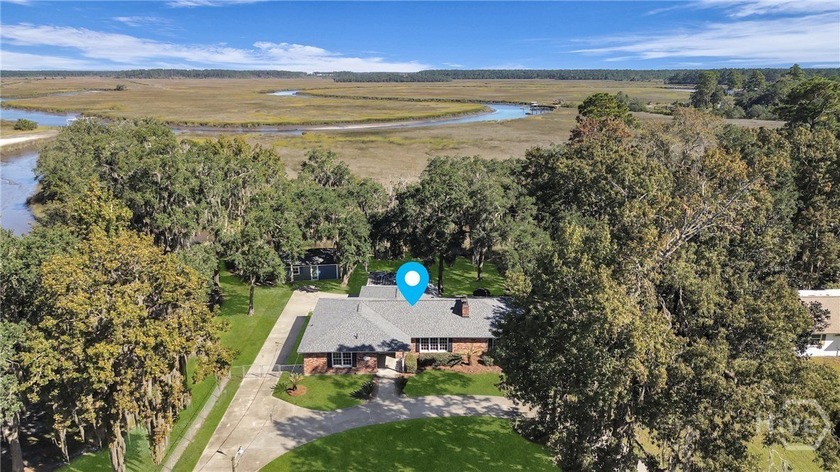 Waterfront home for sale in the Lake George community offering - Beach Home for sale in Midway, Georgia on Beachhouse.com