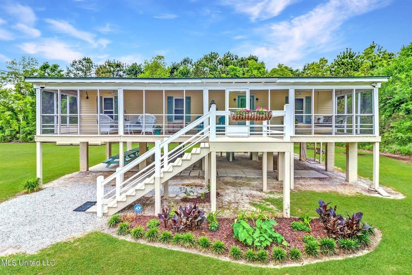 Welcome to your perfect beach retreat! Nestled on a corner lot - Beach Home for sale in Bay Saint Louis, Mississippi on Beachhouse.com