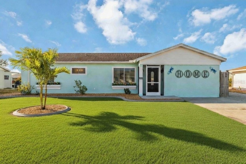 This fully furnished, turnkey home offers three bedrooms and - Beach Home for sale in Port Charlotte, Florida on Beachhouse.com