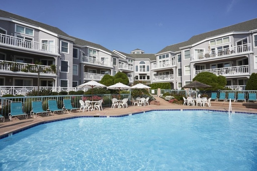 Experience serene pool views from your private balcony in this - Beach Condo for sale in Lower Township, New Jersey on Beachhouse.com