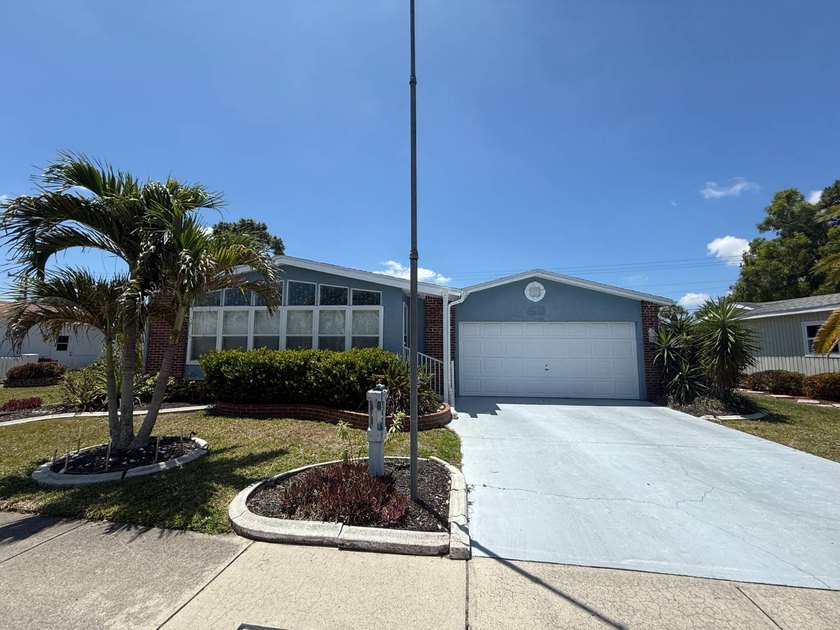 This well cared for stucco home is located on the perimeter of - Beach Home for sale in North Fort Myers, Florida on Beachhouse.com
