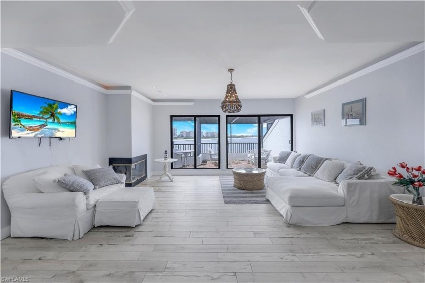 This beautifully remodeled 2-bedroom, 2.5-bathroom retreat - Beach Home for sale in Naples, Florida on Beachhouse.com
