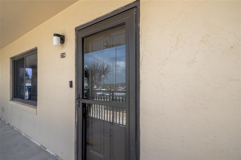 Welcome to your coastal oasis! This beautifully updated - Beach Condo for sale in Ormond Beach, Florida on Beachhouse.com