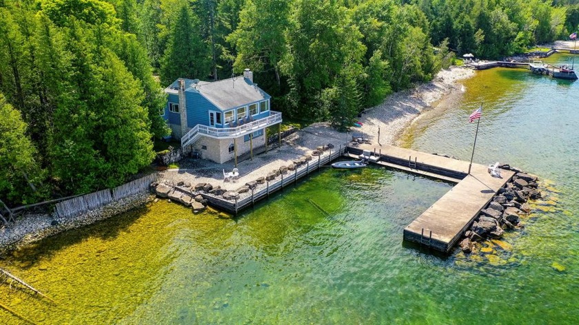 A very rare and stunning waterfront estate.  This stately home - Beach Home for sale in Ellison Bay, Wisconsin on Beachhouse.com