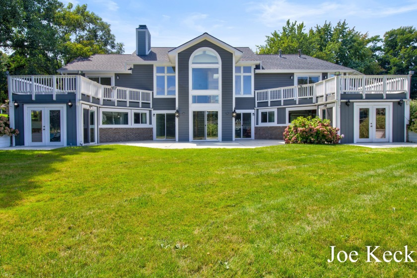 Nestled in Muskegon's exclusive waterfront community, this - Beach Home for sale in Norton Shores, Michigan on Beachhouse.com