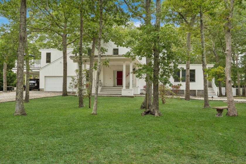 Ponquogue. Nestled on a sprawling 1.4-acre lot, this 4-bedroom - Beach Home for sale in Southampton, New York on Beachhouse.com