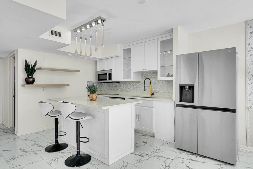 LOWEST PRICED, TRUE 3 Bedroom, 2 Bathroom home with No HOA in - Beach Townhome/Townhouse for sale in Palm Beach Gardens, Florida on Beachhouse.com