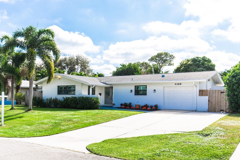 Beautifully remodeled home with large fenced backyard. Most all - Beach Home for sale in Palm Beach Gardens, Florida on Beachhouse.com