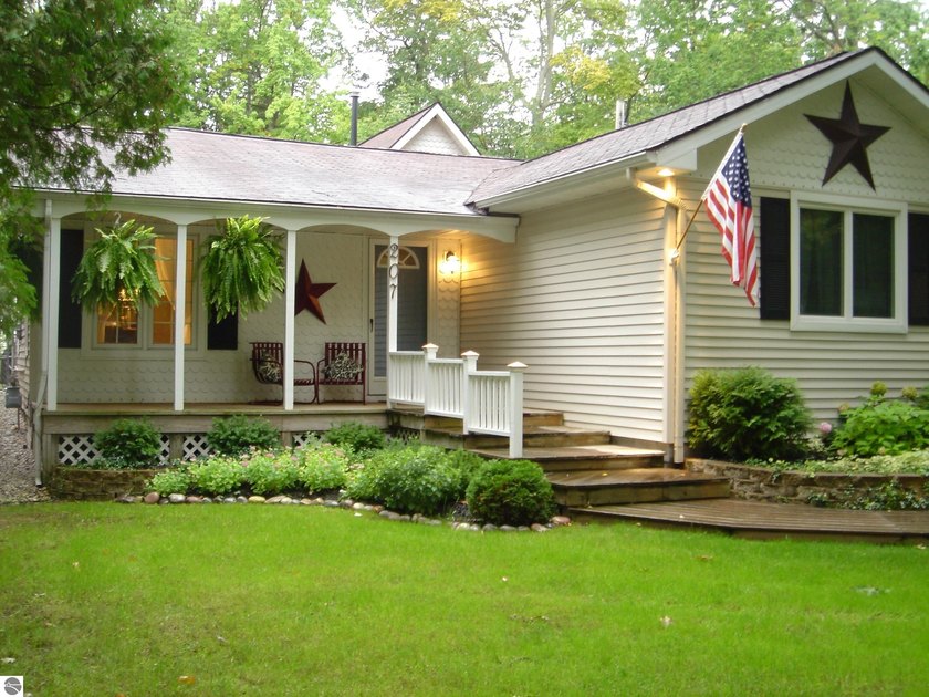 If living close to downtown Traverse City with a neighborhood - Beach Home for sale in Traverse City, Michigan on Beachhouse.com