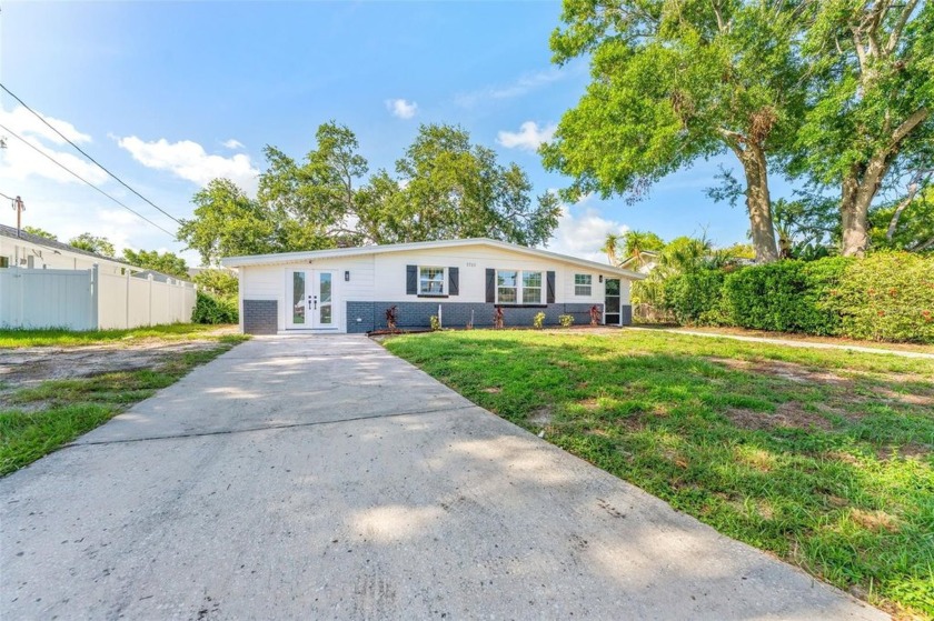 Welcome to this beautifully renovated coastal retreat offering - Beach Home for sale in Tampa, Florida on Beachhouse.com