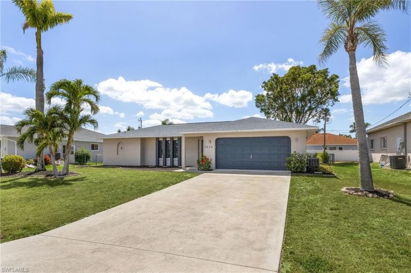 This beautifully maintained 3-bedroom, 2-bathroom pool and - Beach Home for sale in Cape Coral, Florida on Beachhouse.com