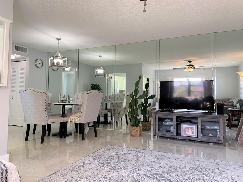 DON'T MISS OUT ON THIS SPECTACULAR TURNKEY GROUND FLOOR, CORNER - Beach Condo for sale in West Palm Beach, Florida on Beachhouse.com