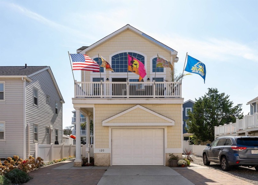 Presenting a stunning three-story contemporary single-family - Beach Home for sale in Sea Isle City, New Jersey on Beachhouse.com