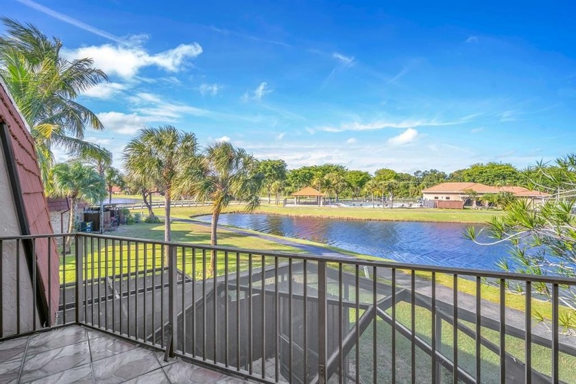 Wake up to stunning lake views from your private balcony! This - Beach Townhome/Townhouse for sale in Boca Raton, Florida on Beachhouse.com