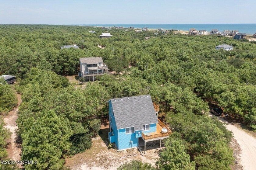 The alluring sounds of the ocean and a laid-back attitude are - Beach Home for sale in Corolla, North Carolina on Beachhouse.com
