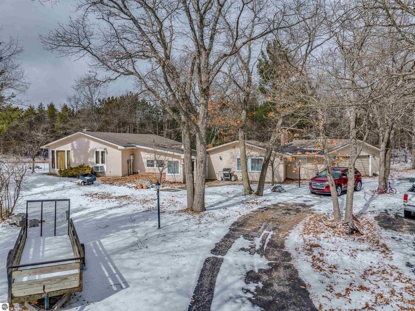 This rambling ranch offers 3 bedrooms and 2 bathrooms on 4.11 - Beach Home for sale in East Tawas, Michigan on Beachhouse.com
