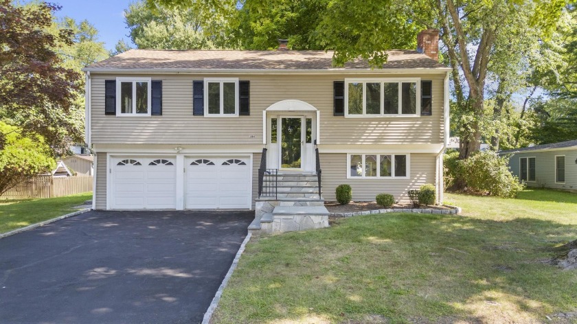 Move right into this beautifully remodeled home located in the - Beach Home for sale in Fairfield, Connecticut on Beachhouse.com