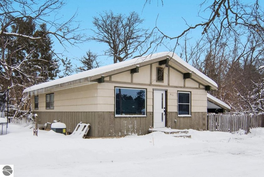 Charming and move-in ready, this updated 3-bedroom, 1-bath home - Beach Home for sale in Traverse City, Michigan on Beachhouse.com
