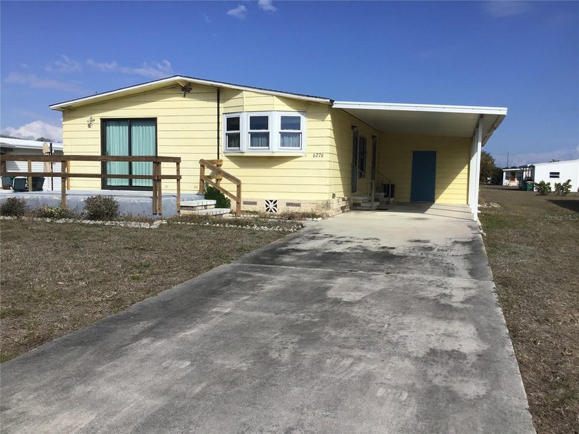 Step into the potential of this spacious double-wide home--an - Beach Home for sale in Englewood, Florida on Beachhouse.com