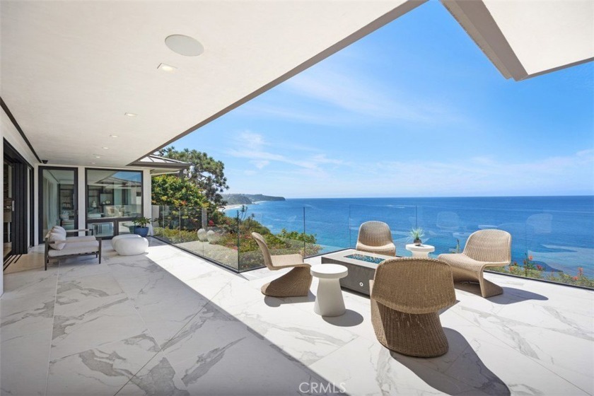 Commanding the front row of the guard-gated Monarch Bay, this - Beach Home for sale in Dana Point, California on Beachhouse.com