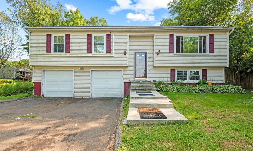 Welcome home to this classic raised ranch, perfectly situated on - Beach Home for sale in New Haven, Connecticut on Beachhouse.com