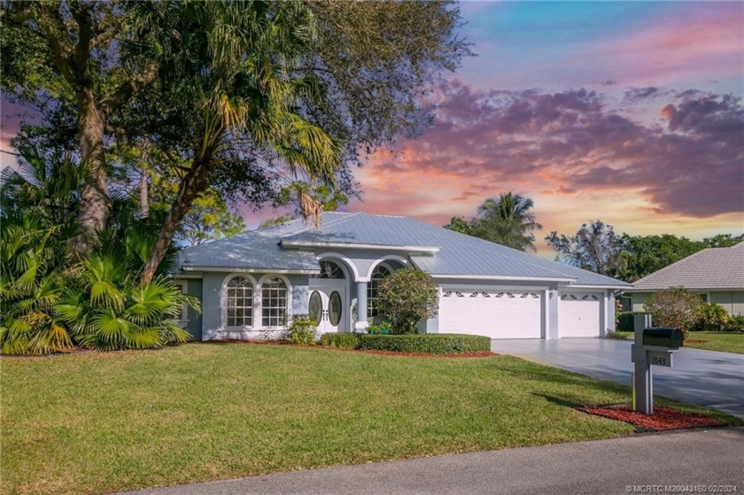 Nestled within the picturesque River Landing gated community - Beach Home for sale in Palm City, Florida on Beachhouse.com