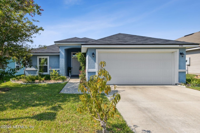 Welcome to this charming single-story home nestled in the - Beach Home for sale in Yulee, Florida on Beachhouse.com