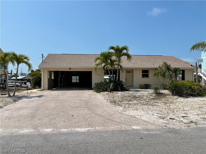 Canal front home with pool and walking distance to the - Beach Home for sale in Fort Myers Beach, Florida on Beachhouse.com