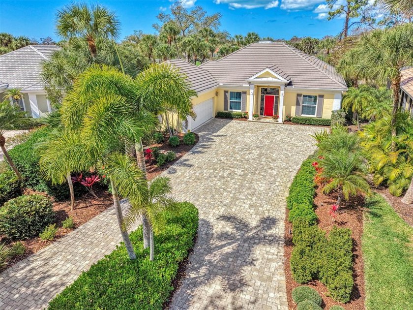 BEAUTIFUL HOME with POND and GOLF COURSE VIEWS! Situated on a - Beach Home for sale in Englewood, Florida on Beachhouse.com