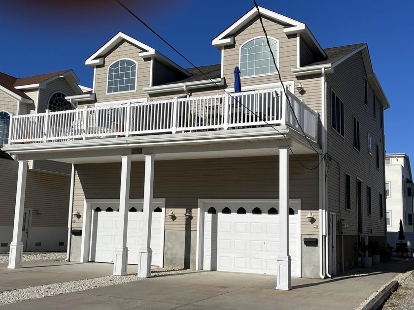 Welcome to this exquisite five-bedroom residence, ideally - Beach Townhome/Townhouse for sale in Sea Isle City, New Jersey on Beachhouse.com