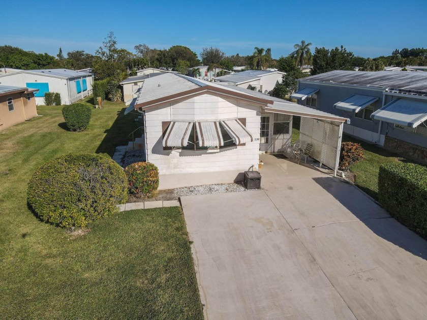 The most adorable home in Cambridge of Heritage Ridge!  This 2/2 - Beach Home for sale in Hobe Sound, Florida on Beachhouse.com