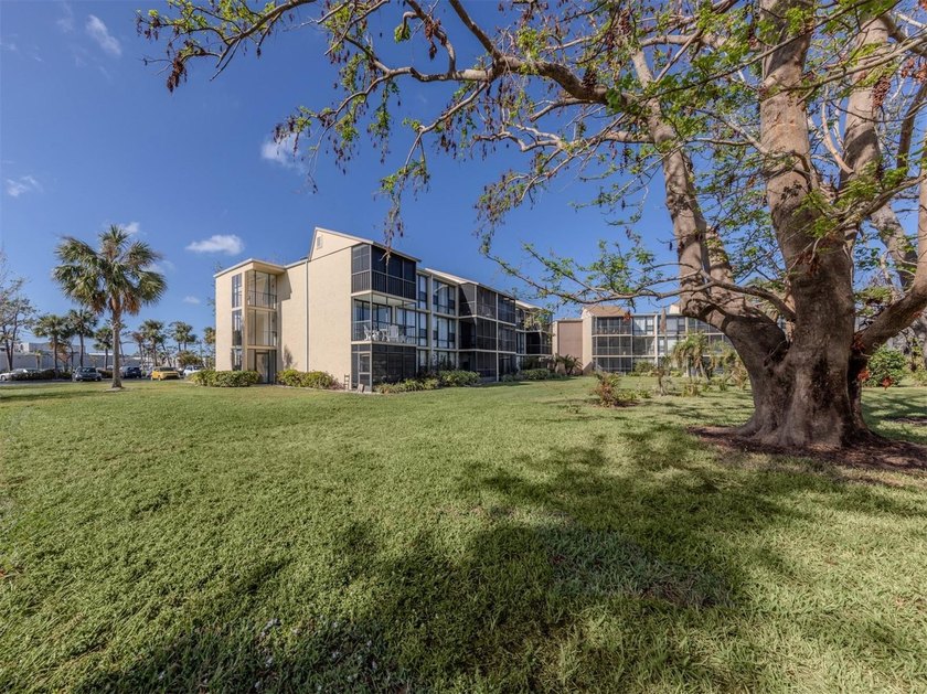 Welcome to this light-filled, corner-unit retreat in the heart - Beach Condo for sale in Venice, Florida on Beachhouse.com