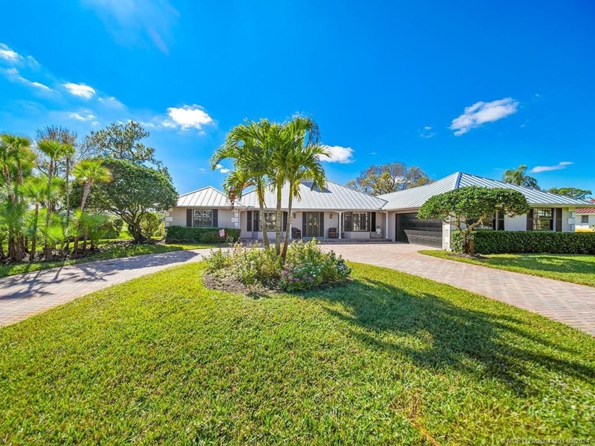 Discover serenity in this stunning 3-bed, 3.5-bath home nestled - Beach Home for sale in Palm City, Florida on Beachhouse.com
