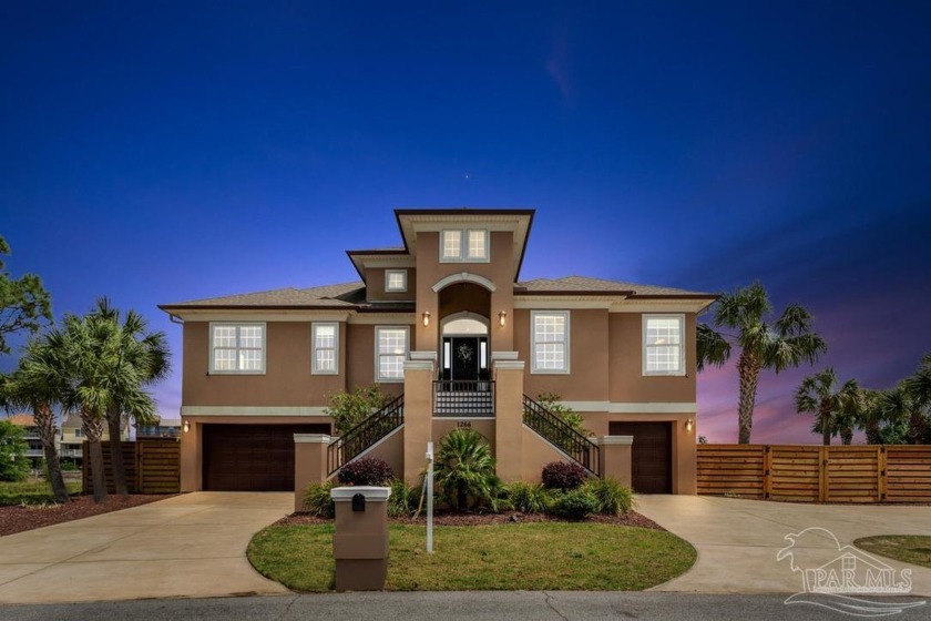 Discover the epitome of coastal living in this exclusive - Beach Home for sale in Gulf Breeze, Florida on Beachhouse.com