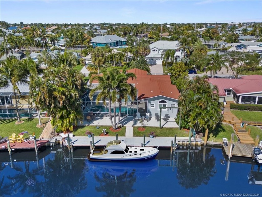 This remarkable waterfront property offers more than meets the - Beach Home for sale in Palm City, Florida on Beachhouse.com