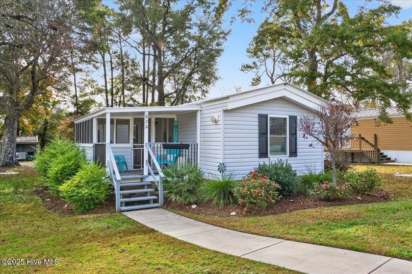 Located in the sought after neighborhood of Seaside Station with - Beach Home for sale in Sunset Beach, North Carolina on Beachhouse.com
